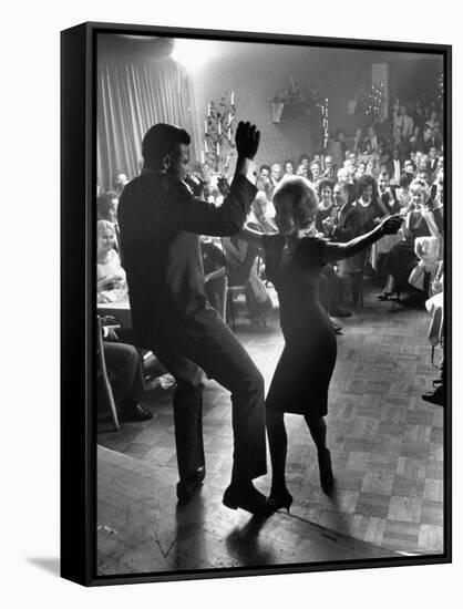 Pop Singer Chubby Checker Singing His Hit Song "The Twist" at the Crescendo Nightclub-Ralph Crane-Framed Stretched Canvas