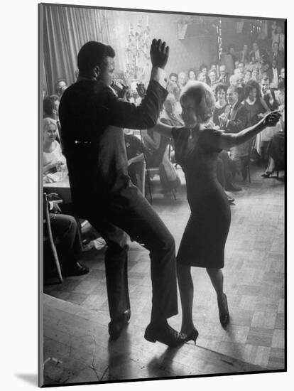Pop Singer Chubby Checker Singing His Hit Song "The Twist" on Dance Floor at Crescendo Nightclub-Ralph Crane-Mounted Premium Photographic Print