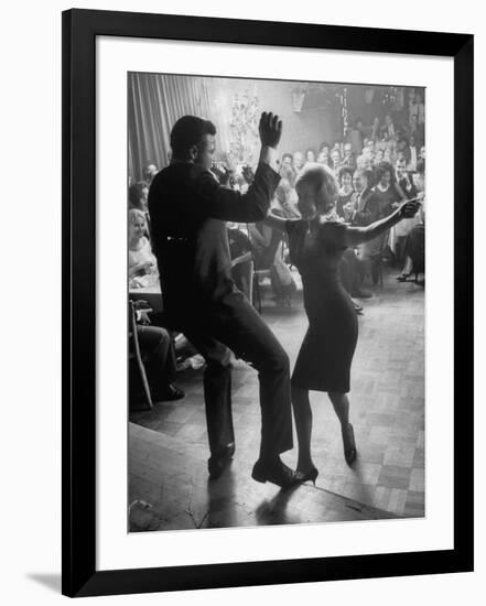 Pop Singer Chubby Checker Singing His Hit Song "The Twist" on Dance Floor at Crescendo Nightclub-Ralph Crane-Framed Premium Photographic Print