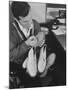 Pop Singer Pat Boone Autographing His White Buck Leather Shoes for Charity-Ralph Morse-Mounted Premium Photographic Print