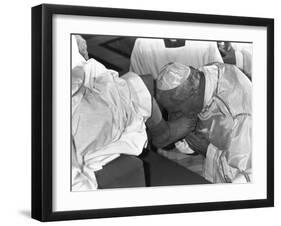 Pope John Paul II Kisses the Feet of One of 12 Mentally Retarded Italians-null-Framed Premium Photographic Print