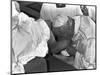 Pope John Paul II Kisses the Feet of One of 12 Mentally Retarded Italians-null-Mounted Photographic Print