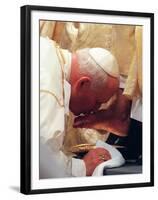 Pope John Paul II Kisses the Foot of a Clergyman-null-Framed Premium Photographic Print