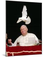 Pope John Paul II Looks at a White Dove After the Angelus Prayer in St. Peter's Square, at Vatican-null-Mounted Photographic Print