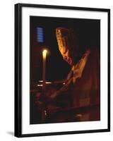 Pope John Paul II Prays Before a Candle at the Beginning of an Holy Easter Vigil Mass-null-Framed Premium Photographic Print