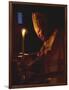 Pope John Paul II Prays Before a Candle at the Beginning of an Holy Easter Vigil Mass-null-Framed Photographic Print