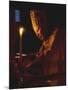 Pope John Paul II Prays Before a Candle at the Beginning of an Holy Easter Vigil Mass-null-Mounted Photographic Print