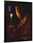 Pope John Paul II Prays Before a Candle at the Beginning of an Holy Easter Vigil Mass-null-Framed Photographic Print