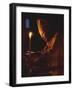 Pope John Paul II Prays Before a Candle at the Beginning of an Holy Easter Vigil Mass-null-Framed Photographic Print