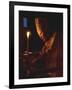 Pope John Paul II Prays Before a Candle at the Beginning of an Holy Easter Vigil Mass-null-Framed Photographic Print