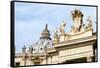 Pope's insignia on the Bernini's colonnade, Piazza San Pietro, Vatican City, Rome, Lazio, Italy-Nico Tondini-Framed Stretched Canvas