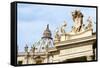 Pope's insignia on the Bernini's colonnade, Piazza San Pietro, Vatican City, Rome, Lazio, Italy-Nico Tondini-Framed Stretched Canvas