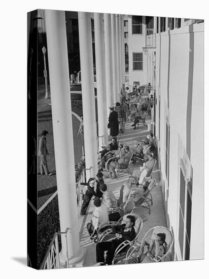 Porch-Sitting, One of Miamians Major Outdoor Sports, White House Hotel-Alfred Eisenstaedt-Stretched Canvas