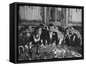 Porfirio Rubirosa and Wife Having Dinner with Friends-Loomis Dean-Framed Stretched Canvas