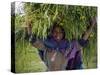 Portait of Local Girl Carrying a Large Bundle of Wheat and Yellow Meskel Flowers, Ethiopia-Gavin Hellier-Stretched Canvas