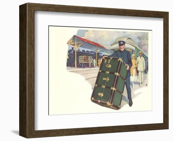 Porter with Large Steamer Trunk-null-Framed Art Print