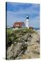 Portland, Maine, USA Famous Head Light lighthouse on rocky cliff.-Bill Bachmann-Stretched Canvas