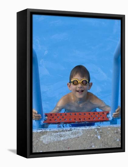 Portrait of 9 Year Old Boy in Swimming Pool, Kiamesha Lake, New York, USA-Paul Sutton-Framed Stretched Canvas