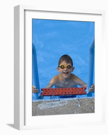 Portrait of 9 Year Old Boy in Swimming Pool, Kiamesha Lake, New York, USA-Paul Sutton-Framed Photographic Print