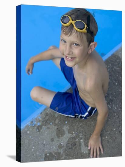 Portrait of 9 Year Old Boy Sitting at the Edge of the Swimming Pool, Kiamesha Lake, New York, USA-Paul Sutton-Stretched Canvas