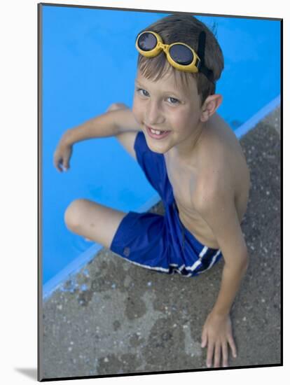 Portrait of 9 Year Old Boy Sitting at the Edge of the Swimming Pool, Kiamesha Lake, New York, USA-Paul Sutton-Mounted Photographic Print