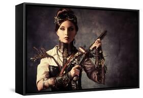 Portrait Of A Beautiful Steampunk Woman Holding A Gun Over Grunge Background-prometeus-Framed Stretched Canvas