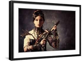 Portrait Of A Beautiful Steampunk Woman Holding A Gun Over Grunge Background-prometeus-Framed Art Print