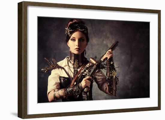 Portrait Of A Beautiful Steampunk Woman Holding A Gun Over Grunge Background-prometeus-Framed Art Print