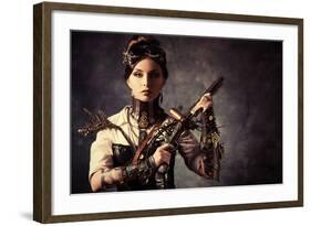 Portrait Of A Beautiful Steampunk Woman Holding A Gun Over Grunge Background-prometeus-Framed Art Print