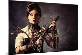 Portrait Of A Beautiful Steampunk Woman Holding A Gun Over Grunge Background-prometeus-Mounted Art Print