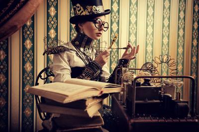 https://imgc.allpostersimages.com/img/posters/portrait-of-a-beautiful-steampunk-woman-over-vintage-background_u-L-PN0OK70.jpg?artPerspective=n