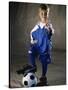 Portrait of a Boy Standing with His Foot on a Soccer Ball-null-Stretched Canvas