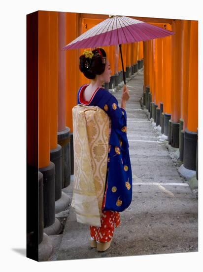 Portrait of a Geisha Holding an Ornate Umbrella at Fushimi-Inari Taisha Shrine, Honshu, Japan-Gavin Hellier-Stretched Canvas