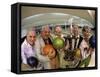 Portrait of a Group of Senior People Holding a Bowling Trophy at a Bowling Alley-null-Framed Stretched Canvas