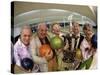 Portrait of a Group of Senior People Holding a Bowling Trophy at a Bowling Alley-null-Stretched Canvas