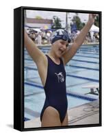 Portrait of a Joyous Girl Standing Beside a Swimming Pool-null-Framed Stretched Canvas