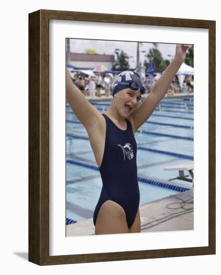 Portrait of a Joyous Girl Standing Beside a Swimming Pool-null-Framed Photographic Print