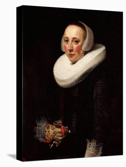 Portrait of a Lady, Standing Three-Quarter Length, in a Black Embroidered Dress-Nicolaes Eliasz. Pickenoy-Stretched Canvas