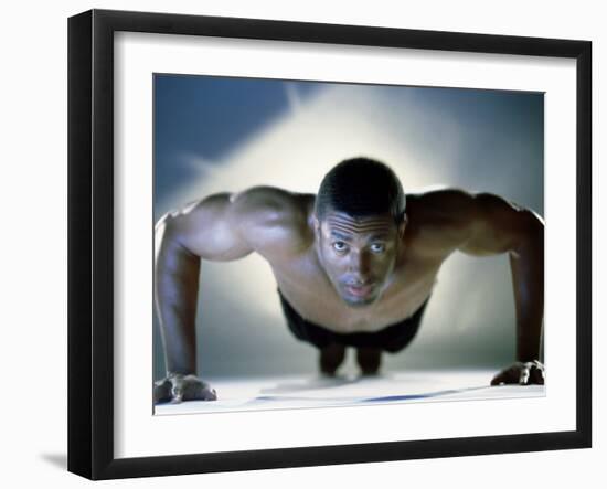 Portrait of a Mid Adult Man Exercising-null-Framed Photographic Print