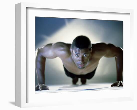 Portrait of a Mid Adult Man Exercising-null-Framed Photographic Print