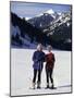 Portrait of a Senior Woman and a Young Woman Standing Wearing Skis-null-Mounted Photographic Print