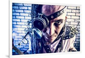 Portrait Of A Steampunk Man With A Mechanical Devices Over Brick Wall-prometeus-Framed Art Print