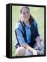 Portrait of a Teenage Girl Sitting on a Lawn Smiling-null-Framed Stretched Canvas