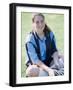 Portrait of a Teenage Girl Sitting on a Lawn Smiling-null-Framed Photographic Print