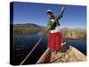 Portrait of a Uros Indian Woman on a Traditional Reed Boat, Lake Titicaca, Peru-Gavin Hellier-Stretched Canvas