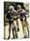 Portrait of a Young Couple Sitting on Bicycles-null-Stretched Canvas