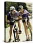 Portrait of a Young Couple Sitting on Bicycles-null-Stretched Canvas