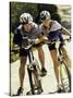 Portrait of a Young Couple Sitting on Bicycles-null-Stretched Canvas