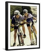 Portrait of a Young Couple Sitting on Bicycles-null-Framed Premium Photographic Print