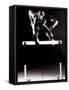 Portrait of a Young Man Jumping over a Hurdle-null-Framed Stretched Canvas